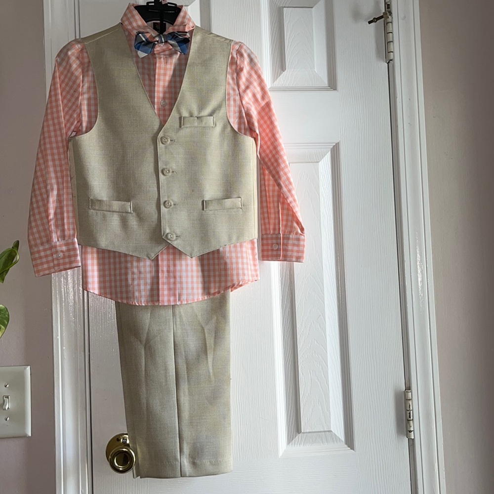 Once used size 7 boys body suit new beige blue and peach tan.